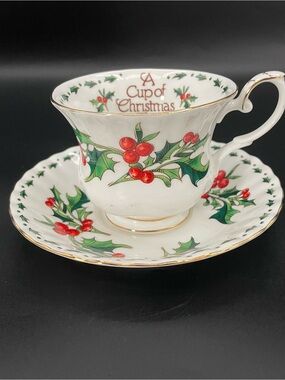 A Cup of Christmas Tea Warren Hanson Waldman House Bone China Cup & Saucer Set